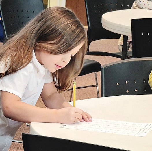 Girl taking test at Stare Academy